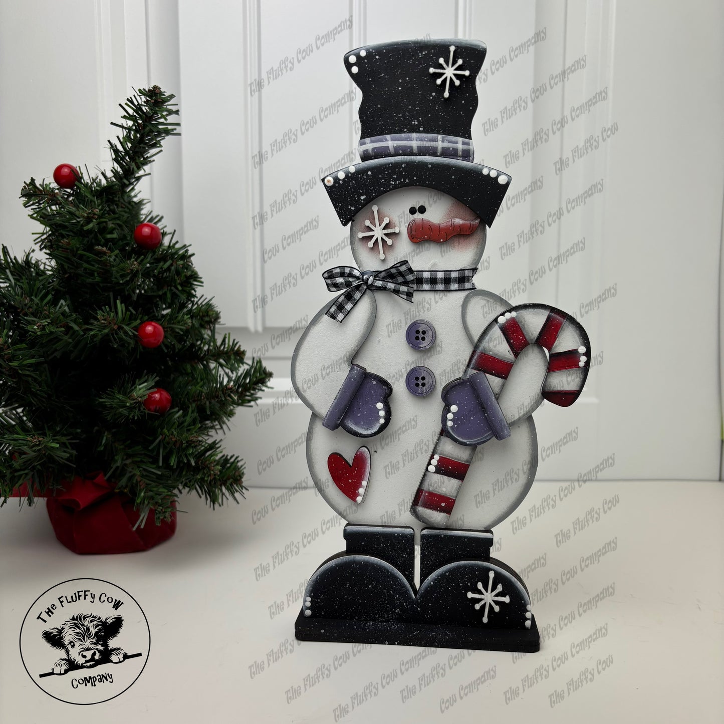 Snowman Holding Candy Cane Shelf Sitter