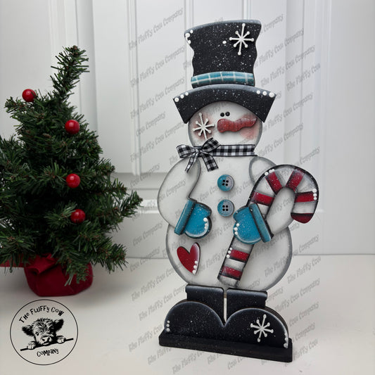 Snowman Holding Candy Cane Shelf Sitter