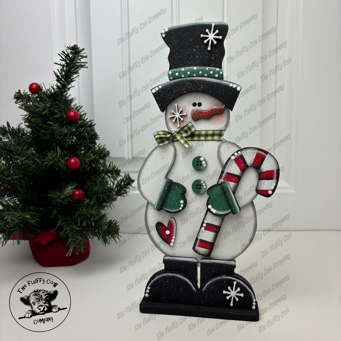 Snowman Holding Candy Cane Shelf Sitter