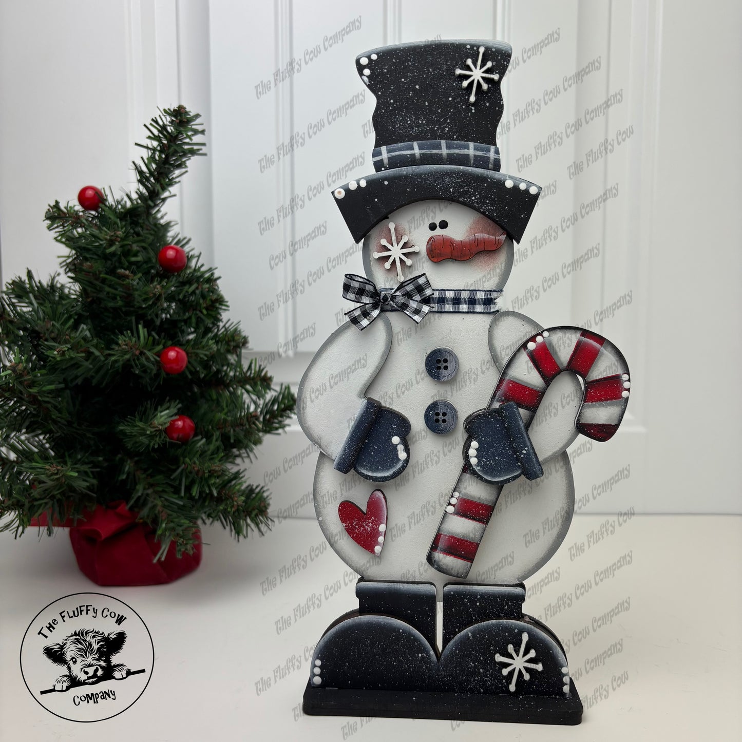 Snowman Holding Candy Cane Shelf Sitter